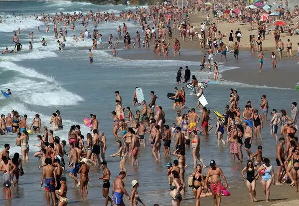 Swim, and Sunbathe in cocoa beach Image