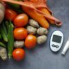 A variety of healthy foods including leafy greens, berries, nuts, and legumes known to help lower blood sugar naturally