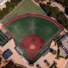 Aerial view of a packed baseball stadium during a night game