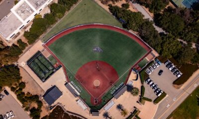Aerial view of a packed baseball stadium during a night game