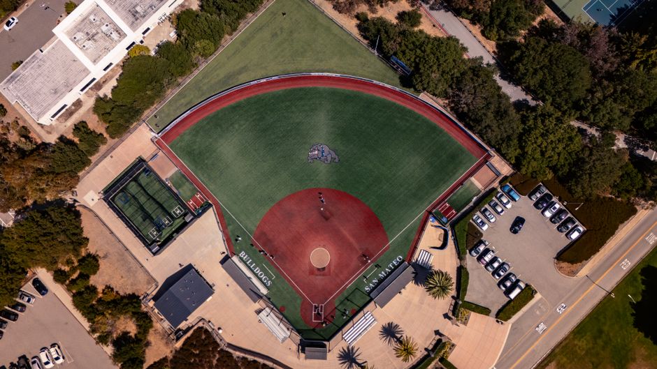 Aerial view of a packed baseball stadium during a night game