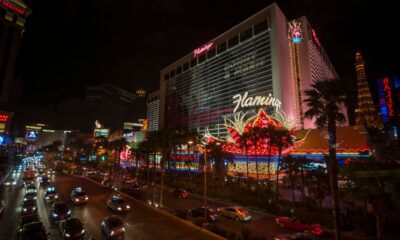 Aerial view of the Las Vegas Strip skyline with illuminated hotels at night