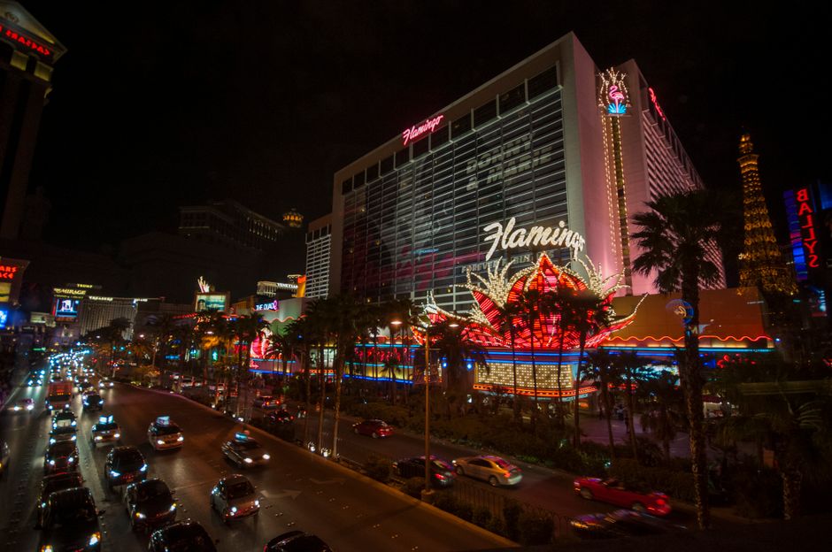 Aerial view of the Las Vegas Strip skyline with illuminated hotels at night