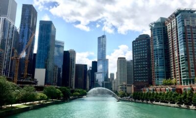 Affordable budget hotel building in downtown Chicago with city skyline in the background