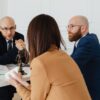 Car accident lawyer consulting with a client in a Georgia law office