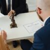Divorce attorney meeting with a client in a California law office