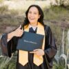 Graduate students celebrating at a California MBA program graduation ceremony