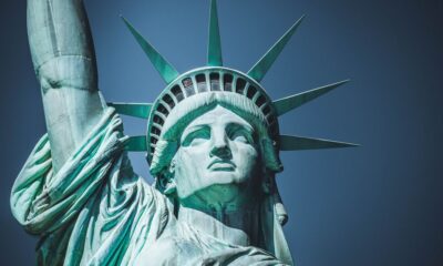 Immigration lawyer consulting with a client in a New York City office
