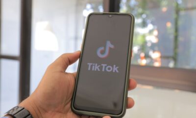Person browsing TikTok Shop on a smartphone to find the best viral products of 2025