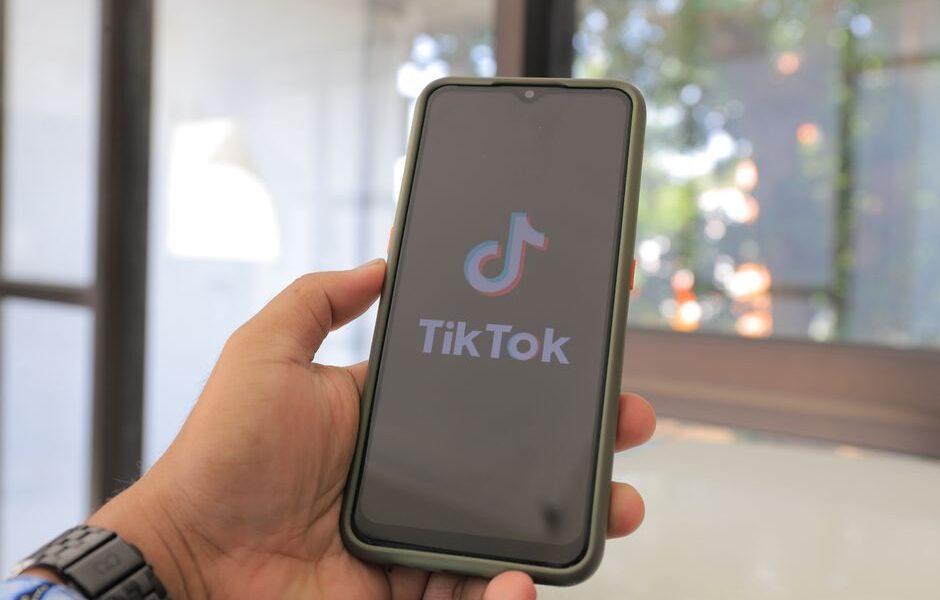 Person browsing TikTok Shop on a smartphone to find the best viral products of 2025