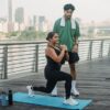 Person working out at home as part of New Year fitness resolutions for 2025
