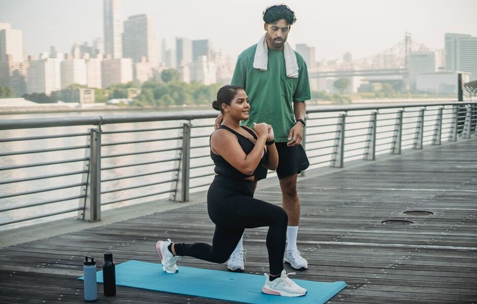 Person working out at home as part of New Year fitness resolutions for 2025