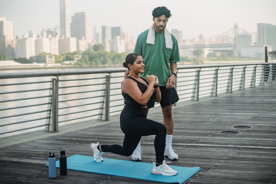 Person working out at home as part of New Year fitness resolutions for 2025