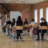 Students in a Georgia charter school classroom working together on a project