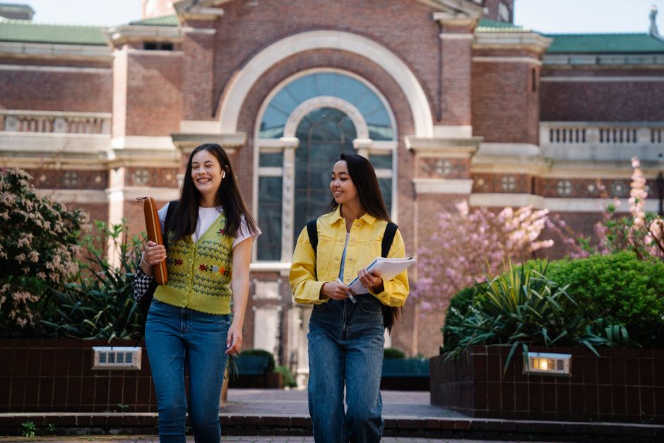 Students walking across a private school campus in Texas