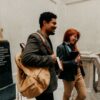 Students walking outside a prestigious law school building on a university campus