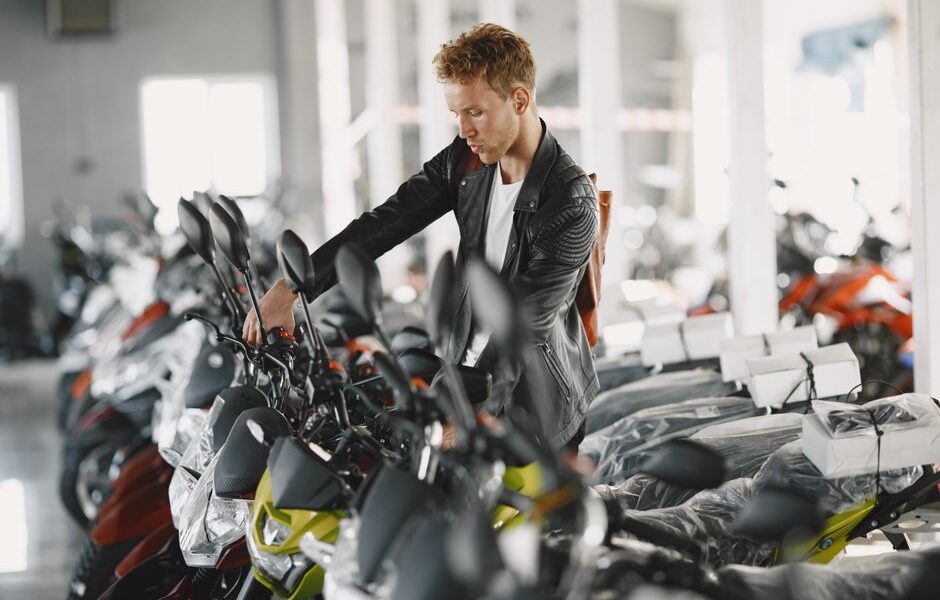 Rows of motorcycles on display inside a Florida motorcycle dealership showroom