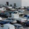 Rows of new cars parked at a car dealership in Texas