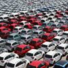 Rows of used cars for sale at a Florida car dealership lot